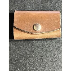 Vintage genuine leather button snap key holder.